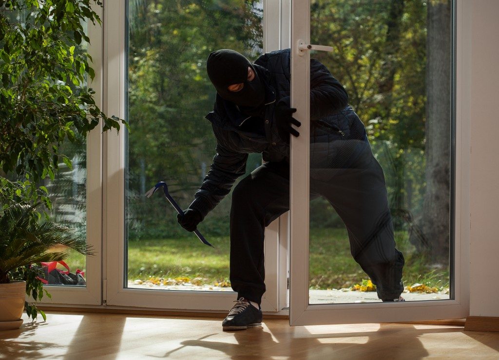a burglar breaking in